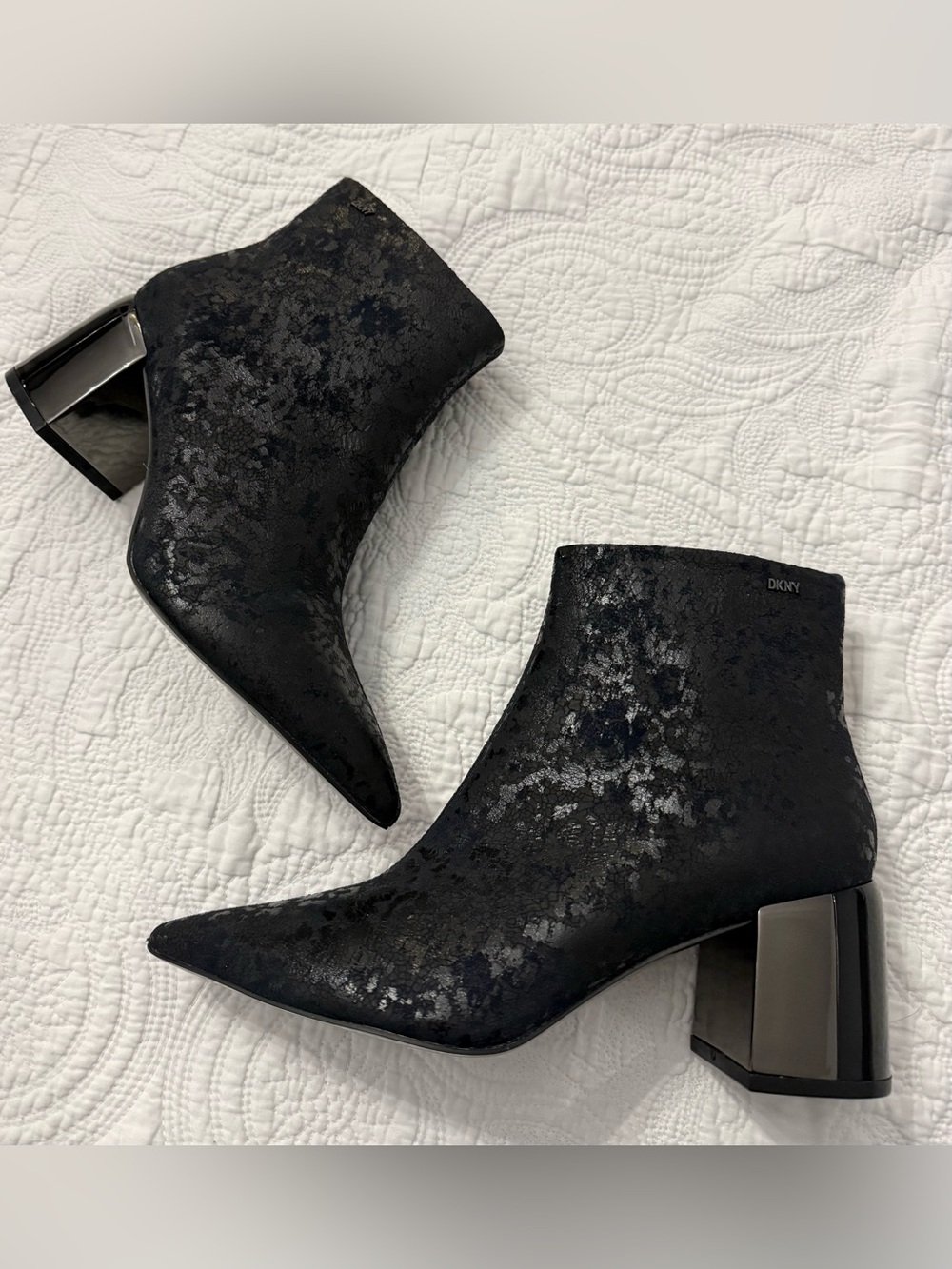 DKNY Daniella ankle boots featuring a distinct metallic pattern and a block heel